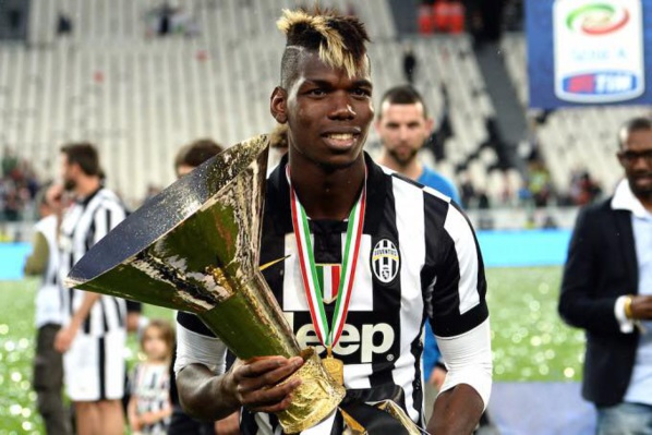 FOOTBALL/TRANSFERT /  POGBA À MANCHESTER UNITED POUR LE TRANSFERT LE PLUS CHER DE L'HISTOIRE.